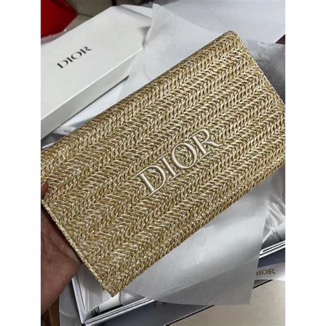 dior sunscreen with clutch